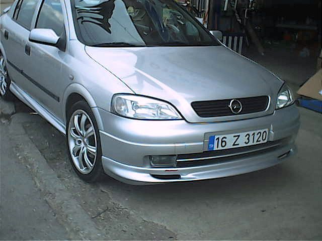 Передняя нижняя накладка Sedan (под покраску) для Opel Astra G classic 1998-2012 гг