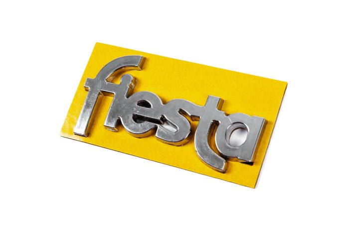 Надпись Fiesta 8401a (69мм на 35мм, на дверь) для Ford Fiesta 1995-2001 гг